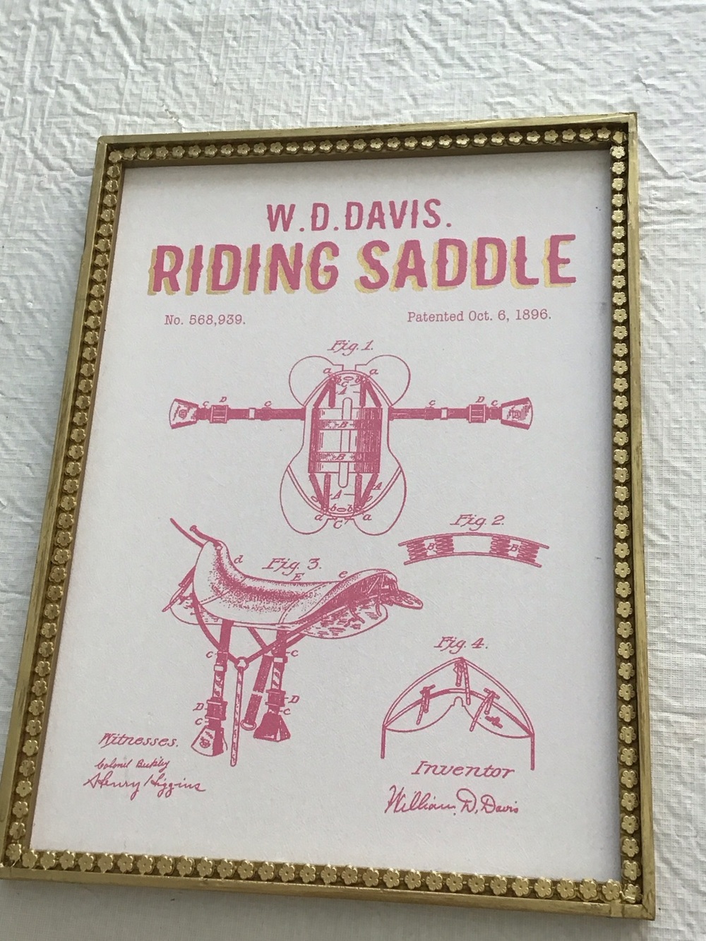 Ashland Pink Riding Saddle Patent Wall Art in Gold Frame